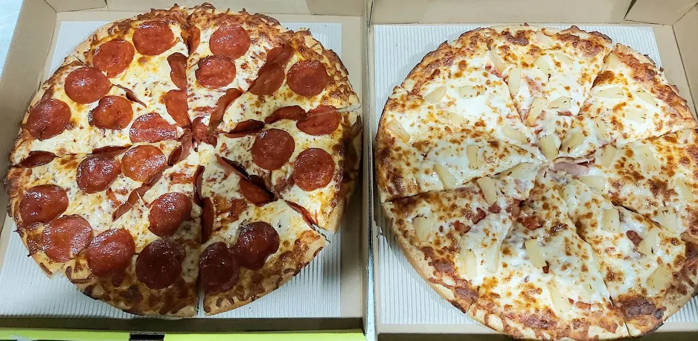 Specialty pizza with premium toppings at Pizza64 Beaumont