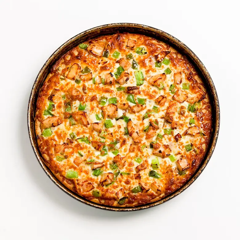 Three Musketeers Pizza at Pizza64 Beaumont - Signature pizza with tandoori chicken